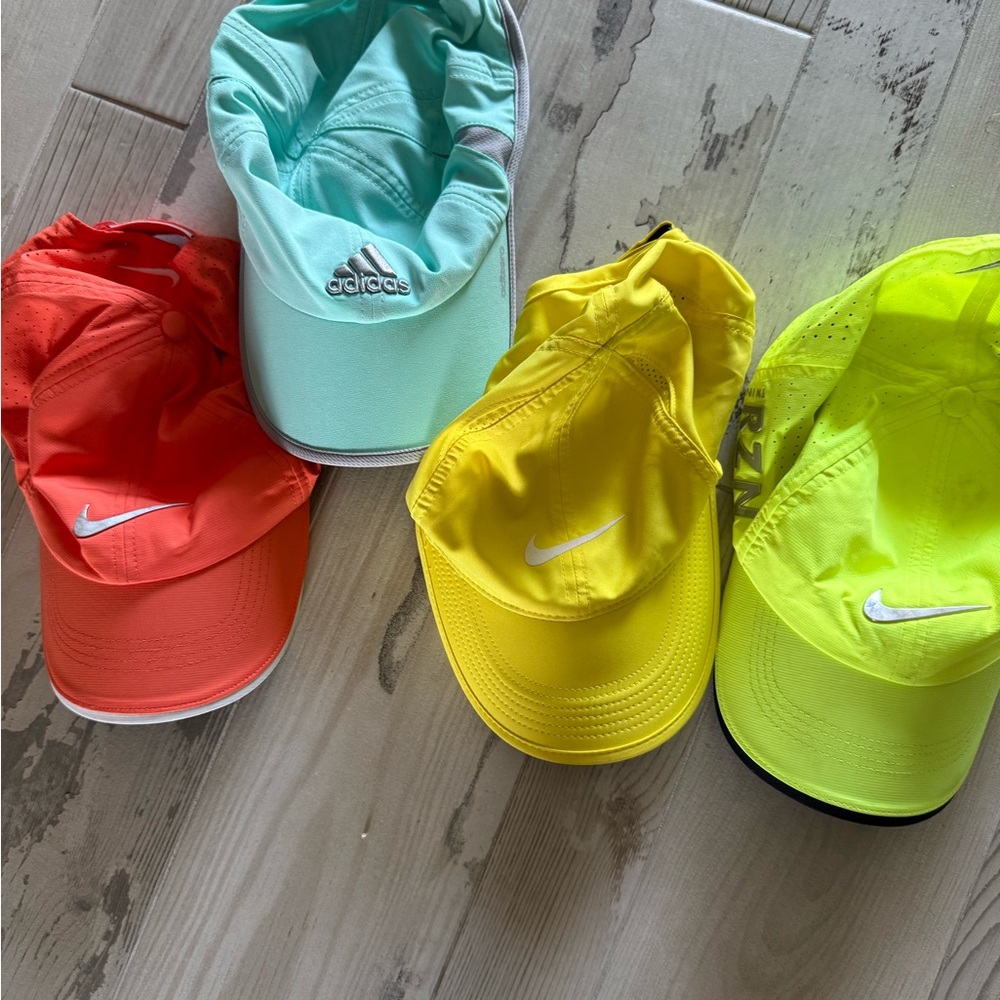 3 Nike women’s golf hats, 1 adidas NWOT